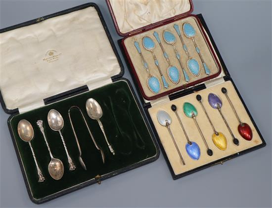 A saced set of six Norwegian white metal and enamel coffee spoons, one other silver set and an incomplete set.